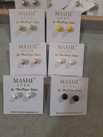 Round pearl studs . Classy and elegant