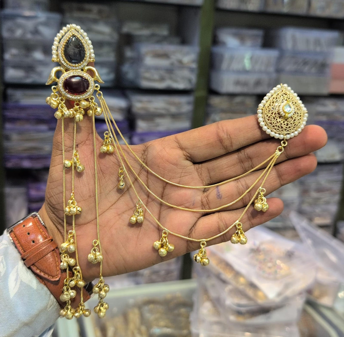 Woman wearing gold earrings in a store setting