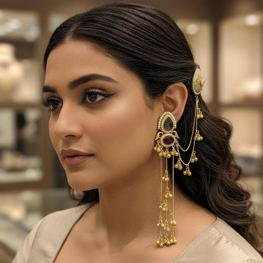 Woman wearing gold earrings in a store setting